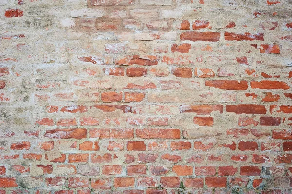 Old brick wall texture with scratches and crack — Stock Photo, Image