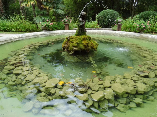 Romantic Fountain in Garden in Europe