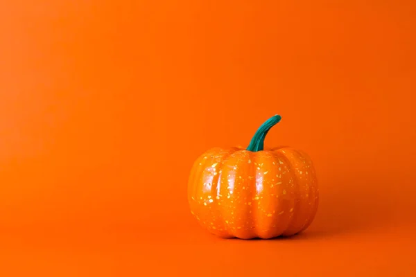 Orange pumpkin on orange background with copy space ,  halloween — Stock Photo, Image