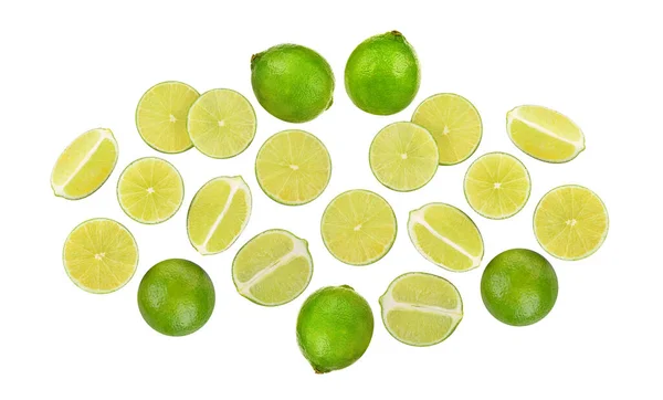 Ganze Limettenfrüchte Und Scheiben Isoliert Auf Weißem Hintergrund Ansicht Von — Stockfoto