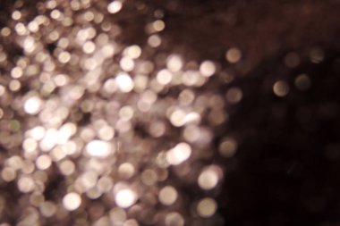 Noel arkaplanı için altın parıltı ve yıldızlar