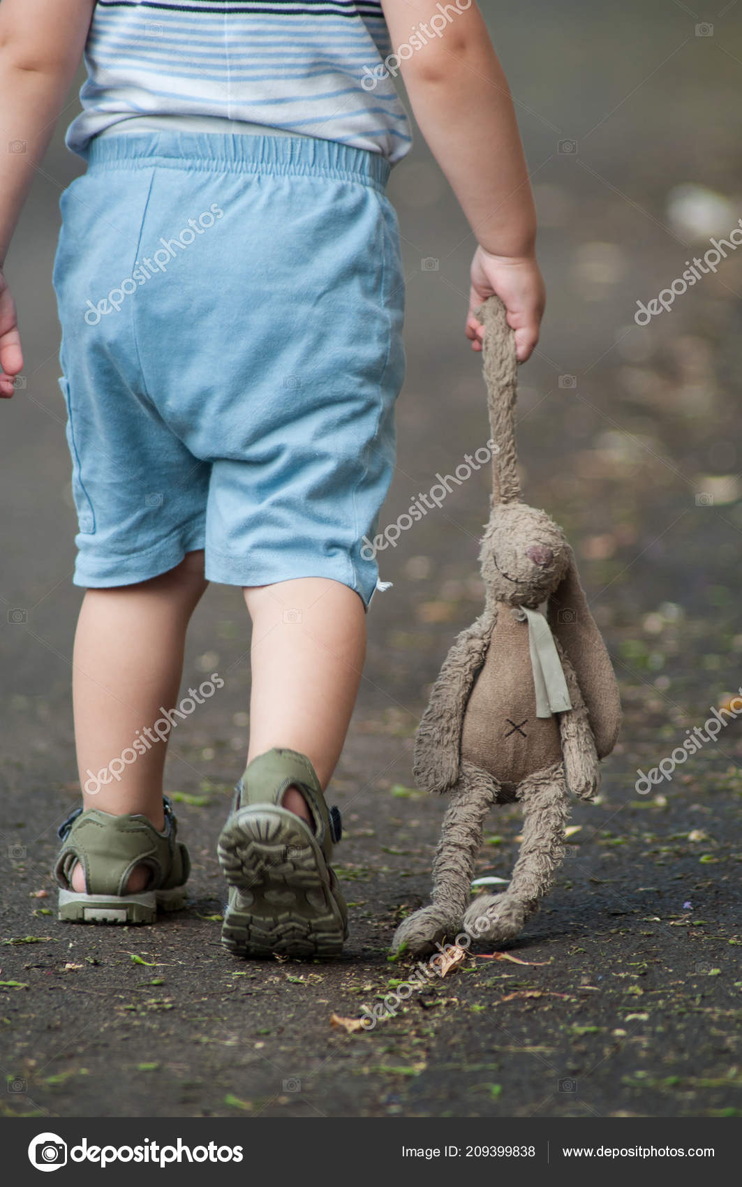 Closeup Child Walking Street Plush Rabbit Hand Dragging Floor