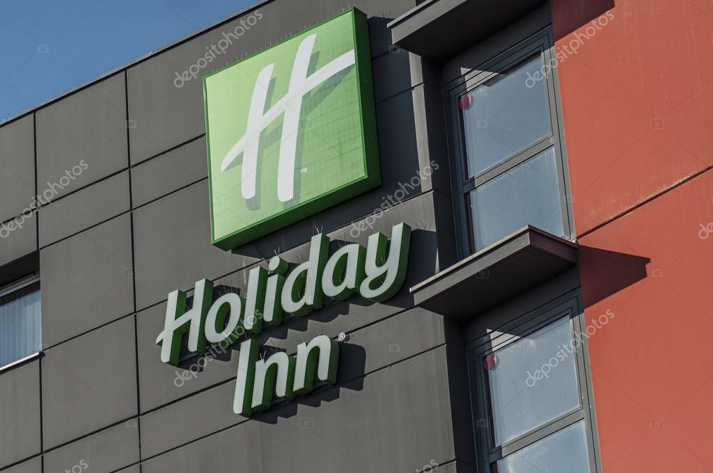 Mulhouse - France - 14 October 2018 - Holiday inn hotel logo on modern building. Holliday Inn is an americain chain company of hostelry