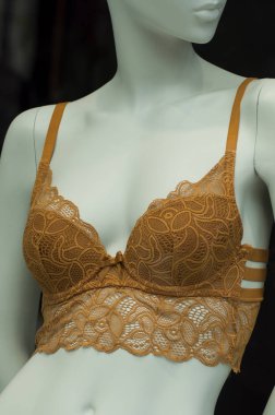 Manken Moda turuncu sutyen closeup kadınlar için showroom mağaza
