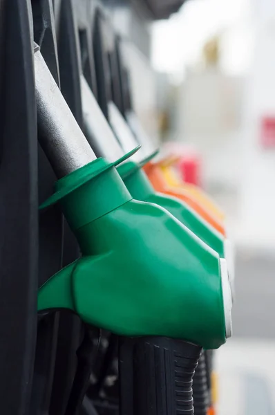 closeup of gas pistols in gas Station