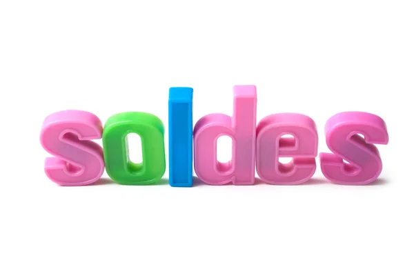 彩色塑料字母在白色背景的特写镜头 索尔德斯在法语 英国的艺术 — 图库照片
