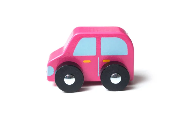 Κοντινό Πλάνο Του Ροζ Μικροσκοπικό Ξύλινο Αυτοκίνητο Λευκό Φόντο — Φωτογραφία Αρχείου