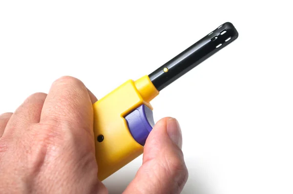 Closeup Yellow Lighter Hand White Background — Stock Photo, Image