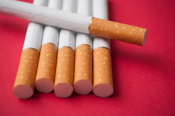 Closeup Cigarettes Red Background — Stock Photo, Image