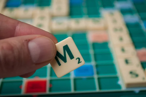 Mulhouse France December 2018 Closeup Plastic Letters Hand Scrabble Board — Stock Photo, Image