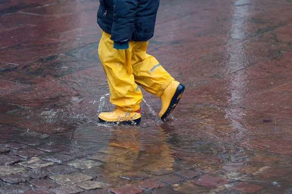 Closeup Boy Playing Puddle Water Yellow Boots — Stock Photo, Image