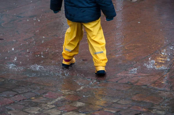 Closeup Boy Playing Puddle Water Yellow Boots — Stock Photo, Image