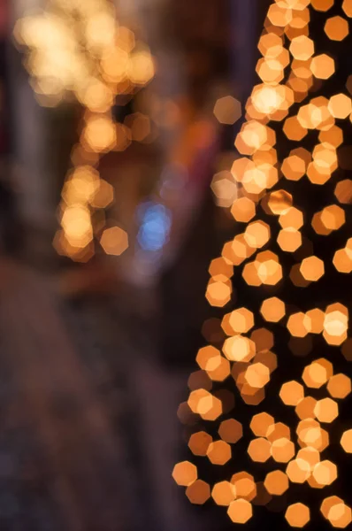 Kerst Vakantie Feestelijke Glinsterende Intreepupil Oranje Achtergrond Met Bokeh Lichten — Stockfoto