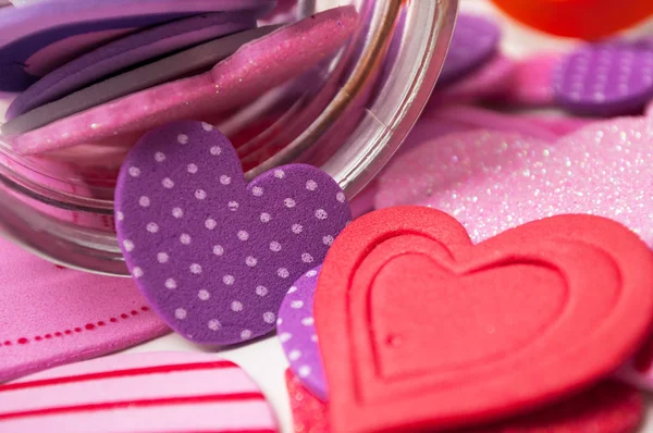 Closeup Pink Red Hearts Falling Glass Container White Background Valentine Stock Image