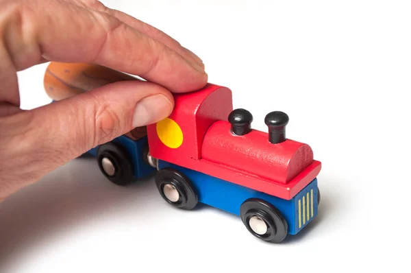 Closeup Man Playing Wooden Train Toy White Background — Stock Photo, Image