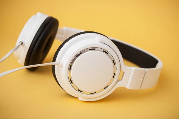 Closeup White Headphones Yellow Background — Stock Photo, Image