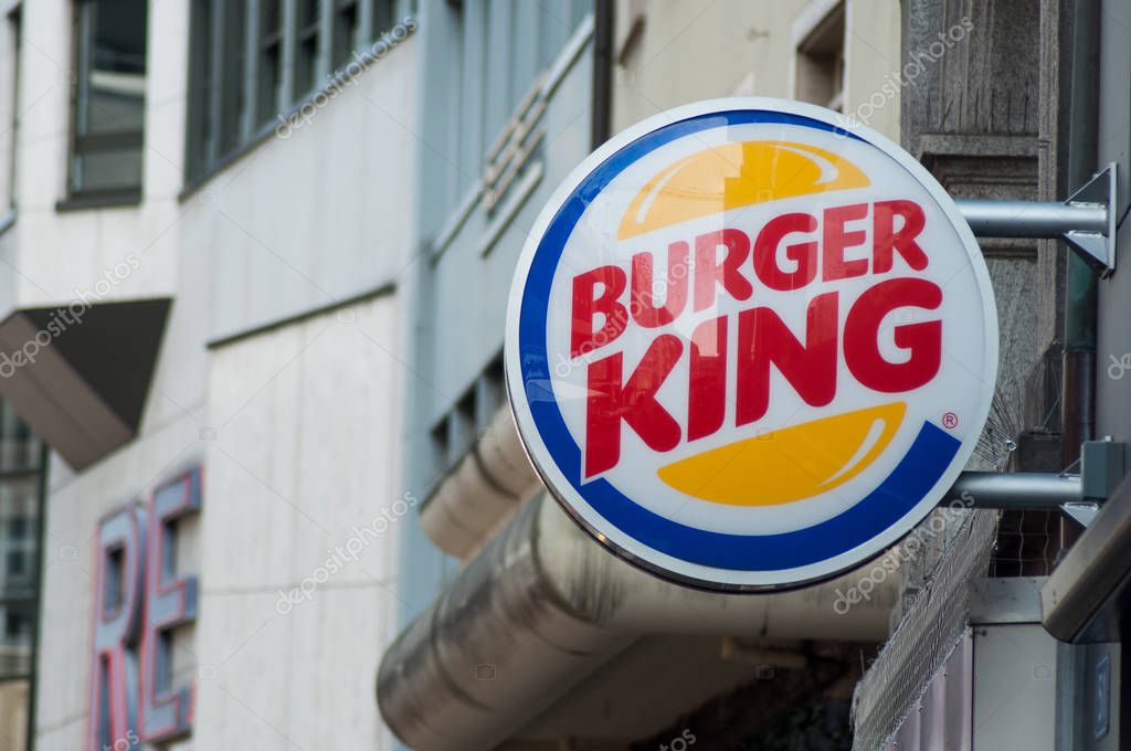 Basel - Switzerland - 19 February 2019 - closeup of Burger king sign in the street, burger king is an american famous brand of fast food chain