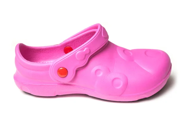 特写镜头粉红色的橡胶鞋在白色的背景 — 图库照片