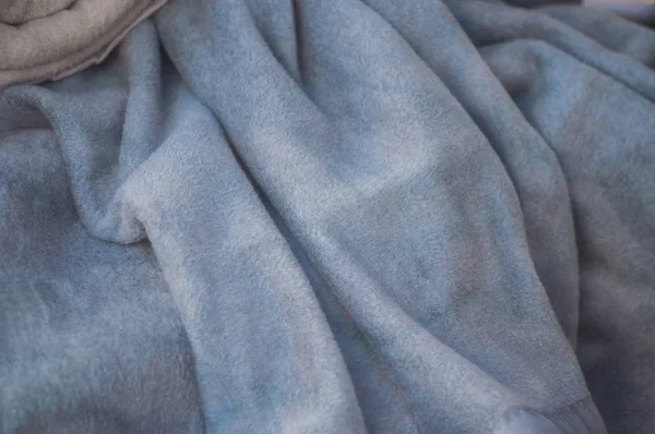 Närbild av blå fluffiga pläd textur — Stockfoto