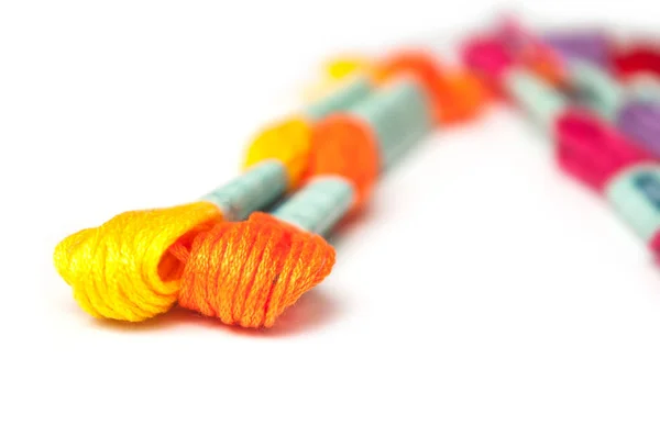 Closeup of colorful cotton threads on white background — Stock Photo, Image