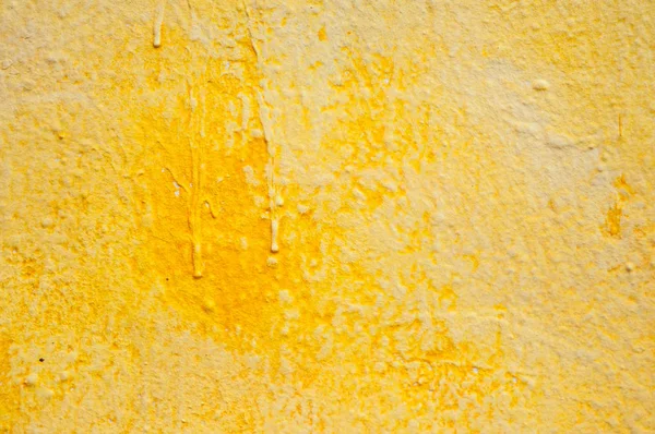 Крупним планом жовтий малюнок на текстурі стіни — стокове фото