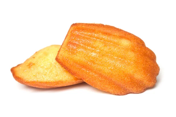 Close-up do bolo madeleines no fundo branco — Fotografia de Stock