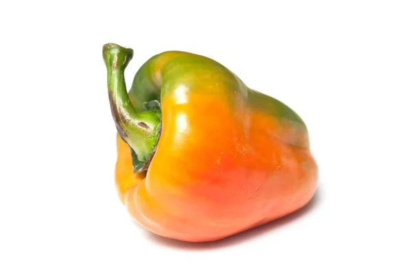 Closeup of orange and green pepper on white background — Stock Photo, Image