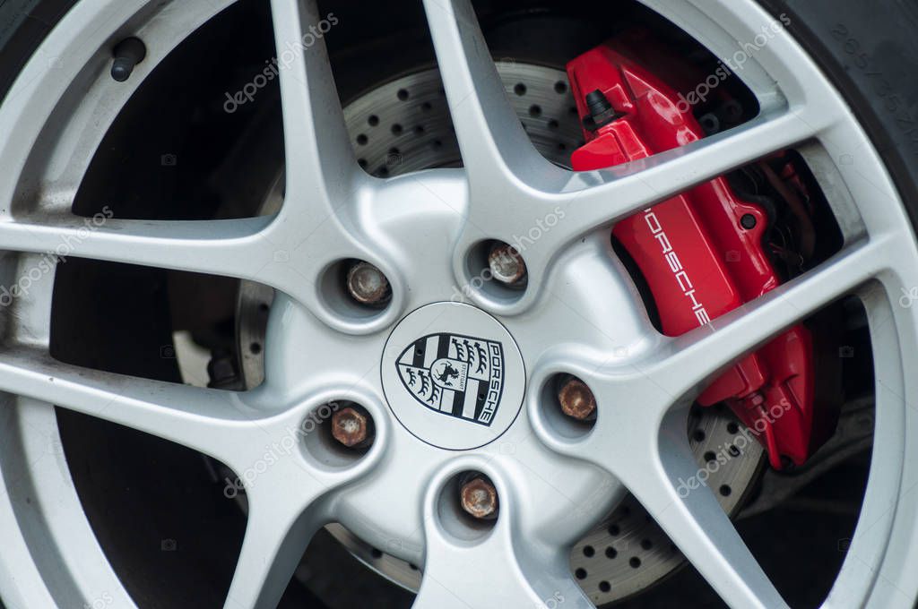 Mulhouse - France - 12 May 2019 - closeup of porsche wheel with red brake