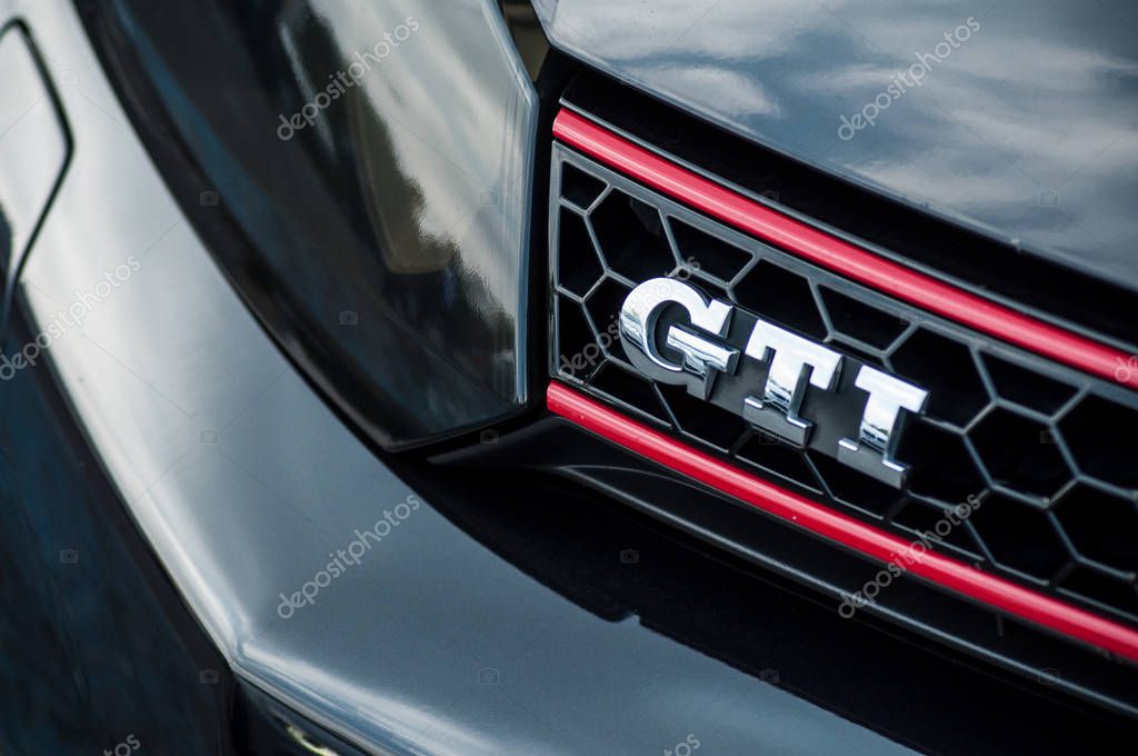 Mulhouse - France - 12 May 2019 - Closeup of GTI sign on black Volkswagen Golf GTI front parked in the street