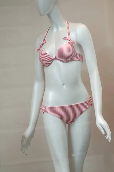 Red stripped bikini on mannequin in fashion store — Stock Photo, Image