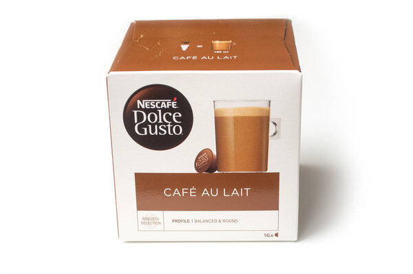 Nescafe expresso capsules in cardboard box, the famous french brand of coffee dose on white background