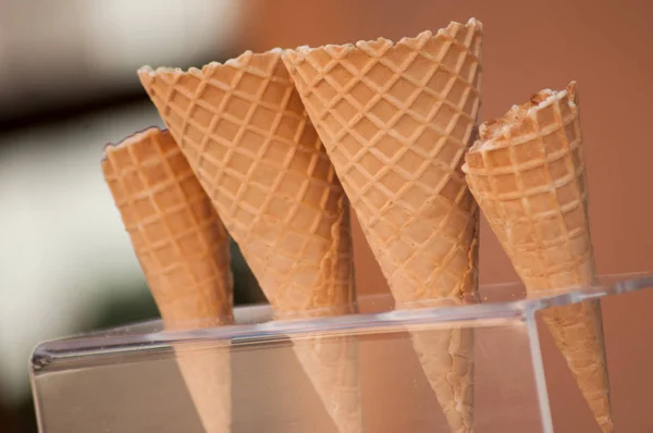 Closeup of ice cream cornets in the street