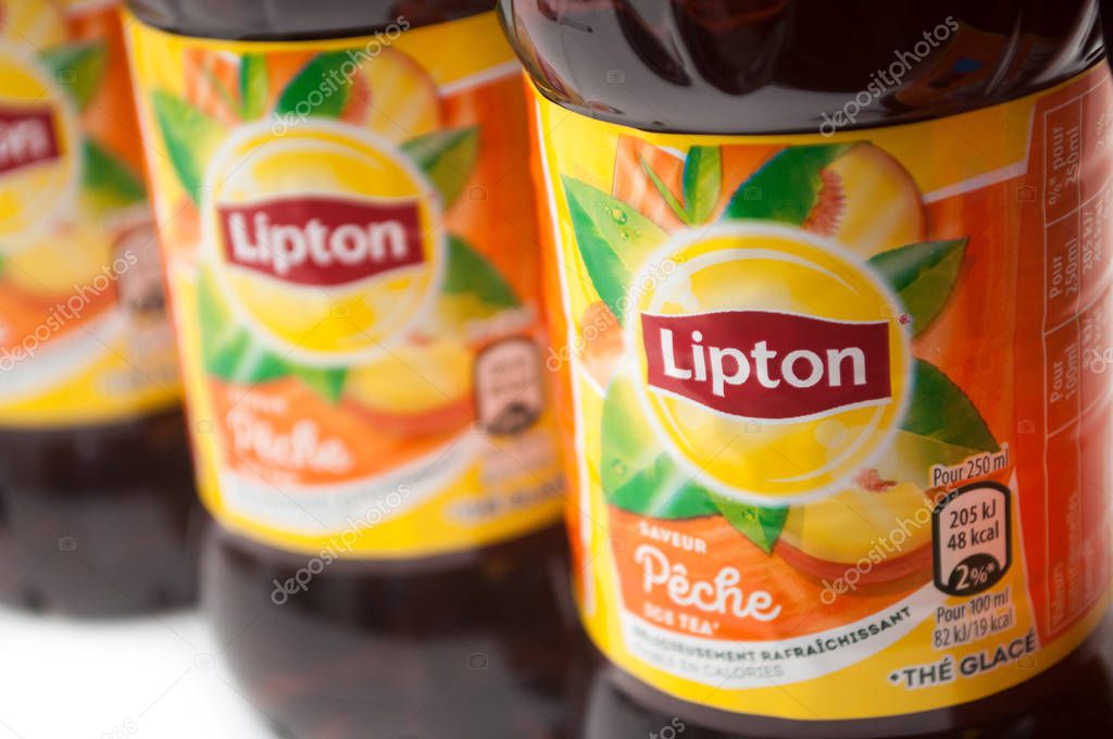 Mulhouse- France - 30 August 2019 - Closeup of Lipton ice tea in plastic bottles on white background