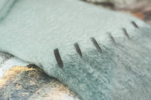 Närbild av pastell filt på sängen textur — Stockfoto