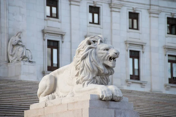View of stoned statue of lion in Lisbon Portugal
