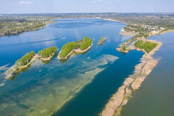 Beautiful lake with sand islands like atol. Lake pogoria in Dabrowa Gornicza Poland aerial drone photo view