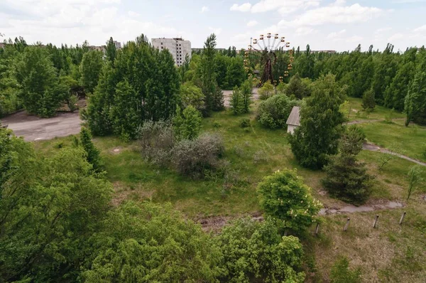 Fun fair, ferris wheel in Prypiat, Chernobyl exclusion Zone. Chernobyl Nuclear Power Plant Zone of Alienation in Ukraine Soviet Union