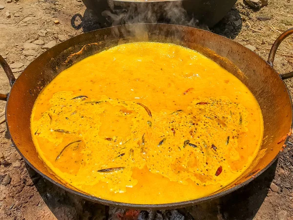 Closeup shot of Indian curry which is making in North Indian marriage during lockdown days in Himachal Pradesh, India