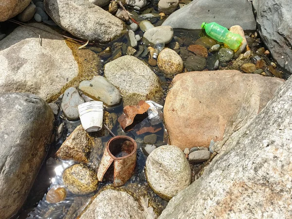 Water pollution, Plastic bottle and garbage in river of Himachal Pradesh, India