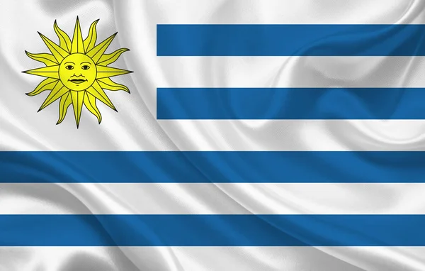 Uruguay country flag on wavy silk fabric background panorama - illustration