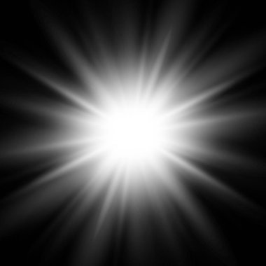 Siyah arka planda parlak, kör edici bir güneş.