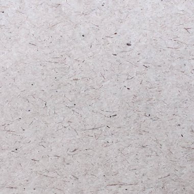 Üzerinde bir sürü küçük nesne bulunan gri karton kağıt.