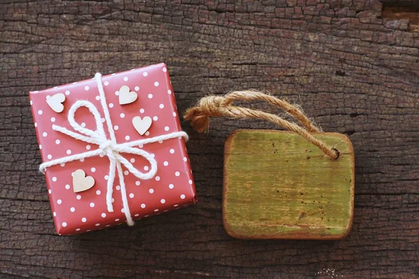 Elegant Red Gift Box Decorated Mini Heart Figure Wood Background — Stock Photo, Image