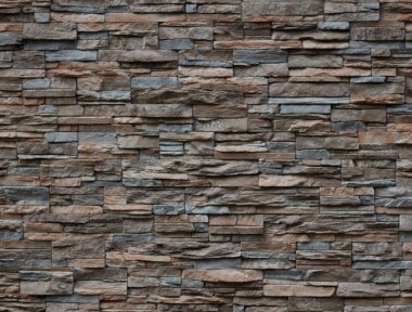 Kırılmamış gerçek taş duvar yüzeyi. Modern biçim tasarımı.