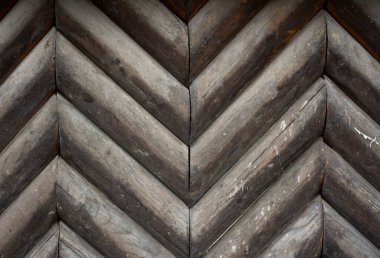 Sembol desenli ahşap kütüklere yakından bak. Sembol Deseni Günlük Kordonu Paneli. Arkaplan, doku.