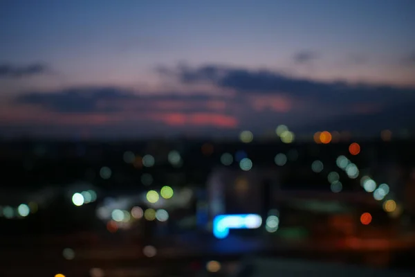 Imagem borrão bokeh da cidade da noite — Fotografia de Stock