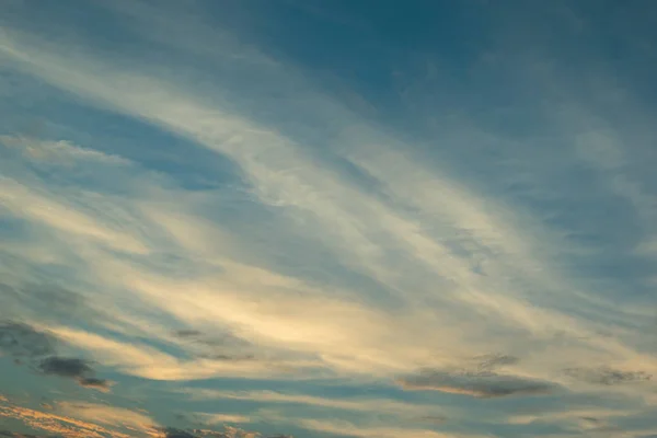 sunlight through cloud on dramatic sunset sky