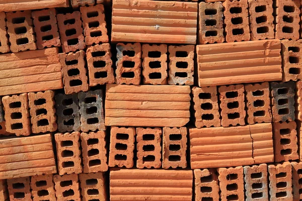 Bakstenen blok bouwmateriaal in site bouw — Stockfoto
