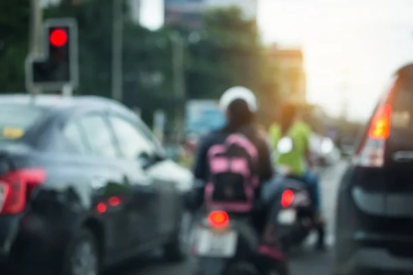 Car driving on urban road, image blur background — Stock Photo, Image