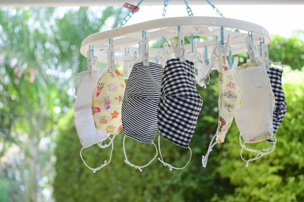 washing clean fabric mask hanging dry disinfect for wearing reuse